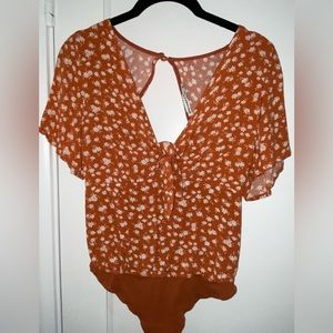 Orange floral bodysuit